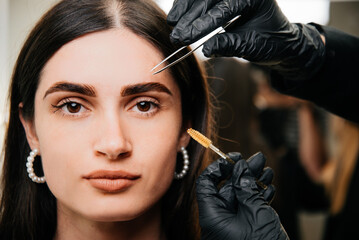 Eyebrow Tweezers. Making the shape of the eyebrows