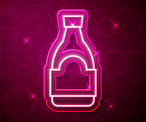 Glowing neon line Soy sauce bottle icon isolated on red background. Vector