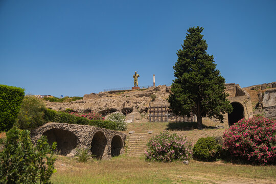 Pompeii, Italy. Ancient city. Monument Dedal Mitoraj - a character of ancient