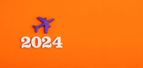 Travel or vacation concept - Year 2024 with airplane