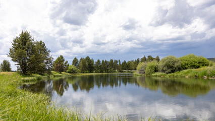 Fototapeta na wymiar Sunriver Oregon Water Reflection, Landscape of Sunriver