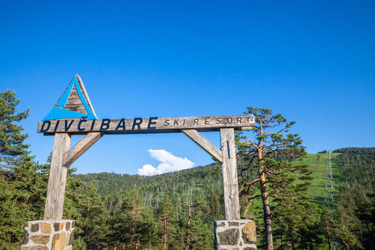 DIVCIBARE, SERBIA - JUNE 4, 2022: Logo of Divcibare ski resort in front of the entrance to the ski slopes. Divcibare is one of the main ski tourism destinations of Serbia..