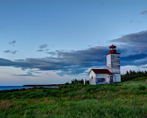 Fototapeta na wymiar lighthouse at dusk with clouds