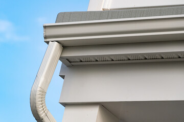 white plastic rain gutter maintenance rain gutter before rainy season