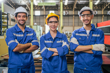 Portrait Group of male and female industrial worker working in factory