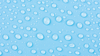 close up of water drops on blue background.