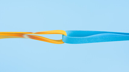 Colorful paper striped  in curls and twisted background.Color spectrum banner.