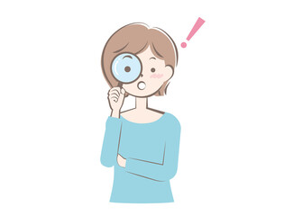 虫眼鏡をのぞく若い女性