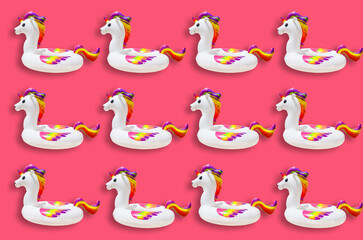 inflatable circle or ring for kids rainbow unicorn for floating in summer vacation isolated on colored background, inflatable toy for child for relaxation on water