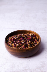 Dried tea leaves with fruits, berries and flowers