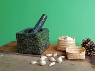mortar and garlic for cooking