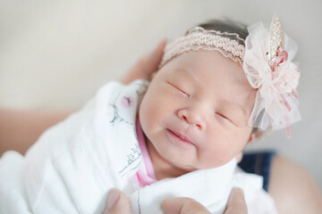 Newborn baby asian girl , 1 day old