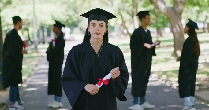 Portrait of a university student at her graduation ceremony outdoors. Woman holding a diploma while celebrating her accomplishment and achievement. Getting a good education for a successful future