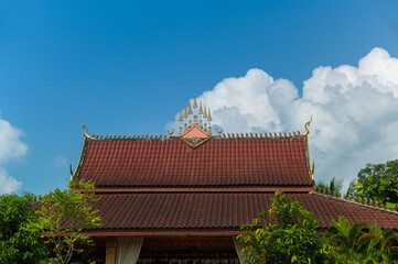 Fototapeta na wymiar Laos Buddhism temple roof on the blue sky