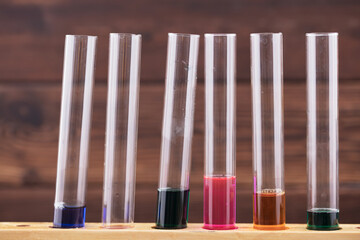 Liquids of different colors are in the test tube