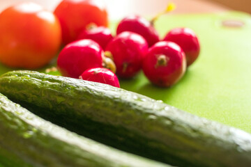 Fresh vegetables on a cutting board. Summer vegetables for salad. Proper nutrition.
