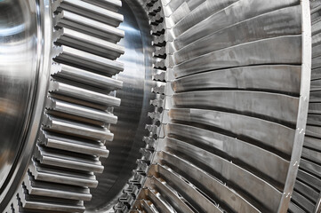 Rotor of modern steam turbine in plant workshop closeup