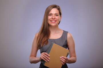 Woman teacher or adult student holding book or workbook, smiling business person, Isolated female portrait.