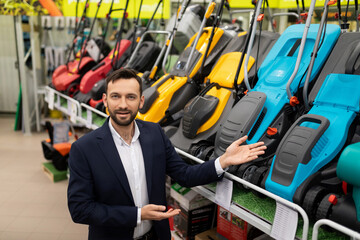 garden equipment store manager offers a wide range of lawn mowers