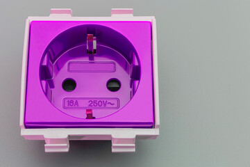 European electrical outlet in purple on a gray background. home electricalian. close-up. full...