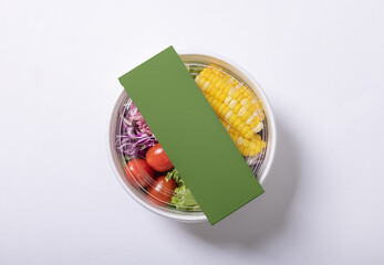 Takeaway food container round box mockup with vegetable and fruit, copy space for your logo or...