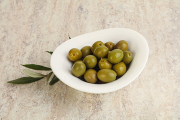 Tasty marinated olives in the bowl