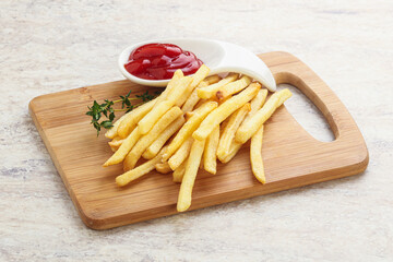 French fried potato over board