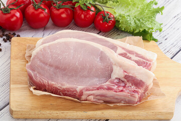 Raw pork t-bone steak for grill