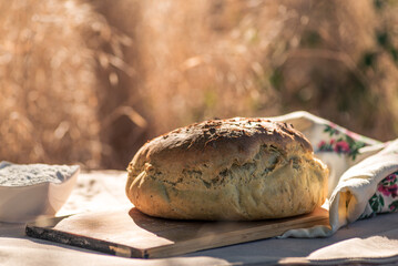 Fresh  baked bread, Homemade sourdough Close up shot of bread and sackcloth, Loaves Traditional Cut a loaf of artisanal