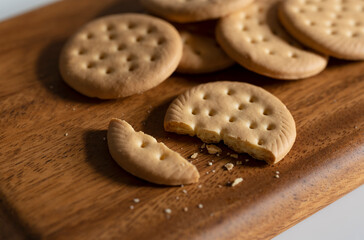 Cookies placed on a cutting board.