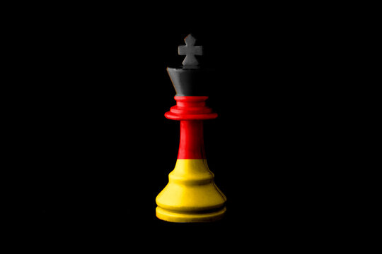 Germany flags paint over on chess king. 3D illustration.