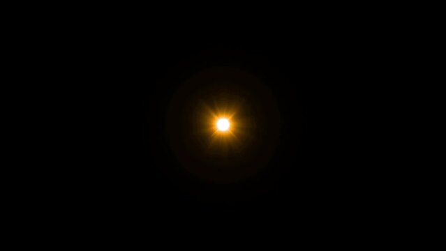 Realistic orange light Lens flare on black background.
