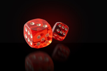 Playing, gambling die, dice for tabletop games and poker isolated on black background with clipping path.