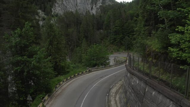 4k aerial video with the windy curved road from Cheile Bicazului Gorges in the Romanian Mountains. Amazing beautiful roads from Romania.