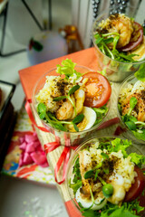 a set of mini salads for catering