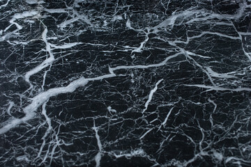 Fototapeta na wymiar A view of an abstract background of black marble.