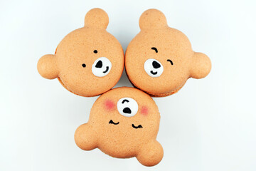Cute macarons in a shape of bears. Creative baking