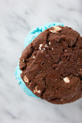 A top down view of a ice cream cookie sandwich.