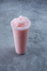 A view of a lychee strawberry frozen beverage.