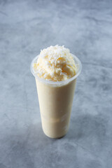 A view of a frozen piña colada beverage.