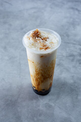A view of a brown sugar boba beverage.