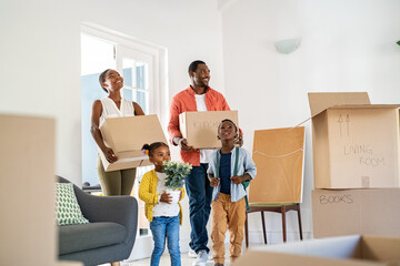 Black family with two children moving house