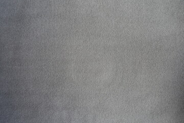 Fototapeta na wymiar View of gray wool, viscose and polyester jersey fabric from above