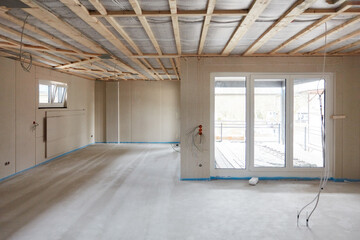 Laying screed by screed layers during interior design of house