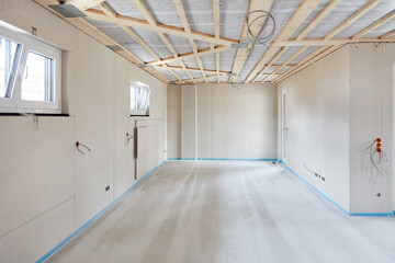 Interior finishing of room with screed in the house as a new building