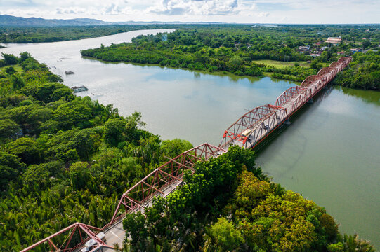 Aerial of the Padilla Bridge, a truss bridge, connecting the town of Bugallon with Balococ, a barangay in the city of Lingayen.