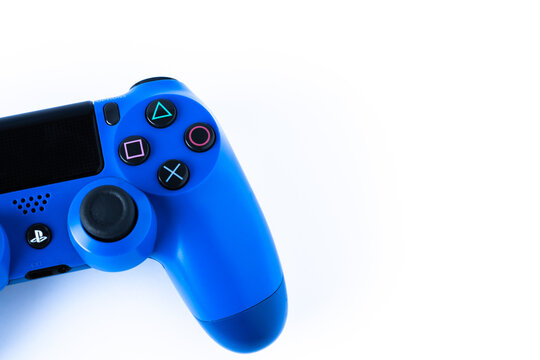 Playstation 4 video game console blue controller - Selective focus
