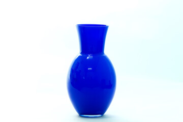 Vase with flowers photographed on a white background