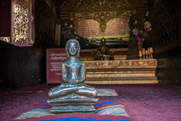Buddha Statue at Wat Xieng Thong, It's a one of the Laos monasteries and monument to the spirit of religion, royalty and traditional art