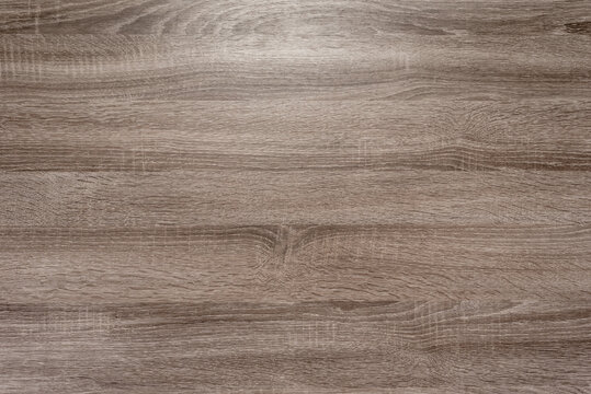 Brown laminate natural wood floor for background